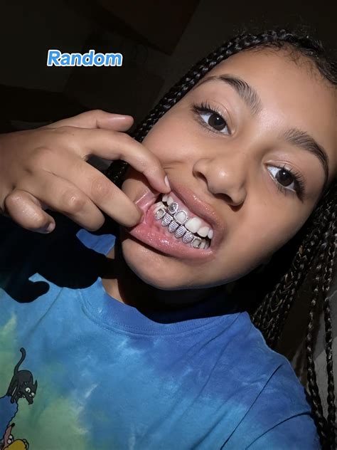 Kanye West's 10 year old daughter North West shows off diamond grills ...