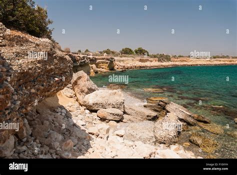 Wild beach with rocks in Dhekelia area. Cyprus Stock Photo - Alamy