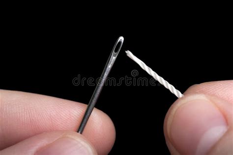 Sewing needle and thread stock photo. Image of female - 14105840