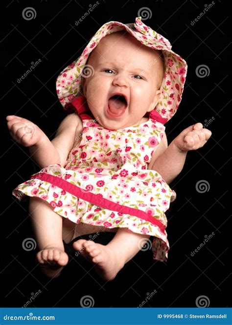 Baby girl laughing stock photo. Image of girl, fist, flowers - 9995468