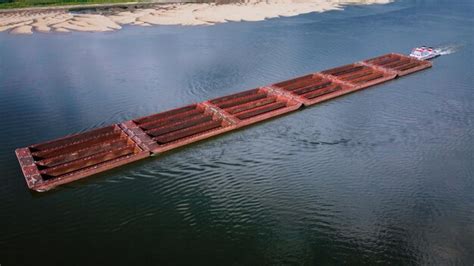 Premium Photo | An empty coal barge on the mississippi river as seen ...