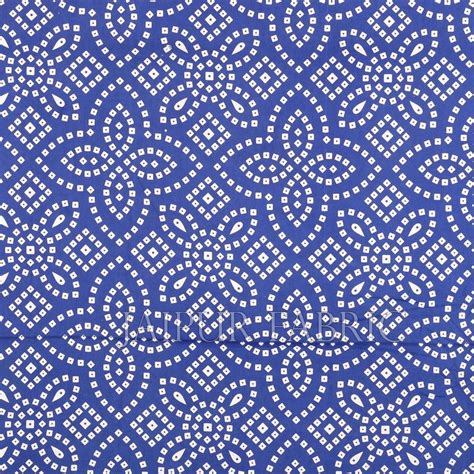 a blue and white background with an intricate design