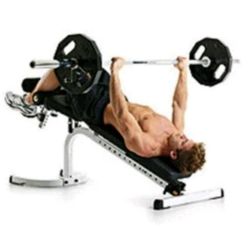 image of man doing Decline Barbell Chest Press | How To Train To Fit ...