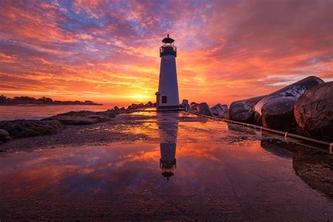 Download Sky Sunrise Reflection Building Man Made Lighthouse HD Wallpaper