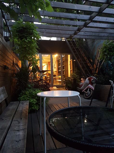 Coffee shop patio at dusk, Kensington Market - Toronto : r/CozyPlaces