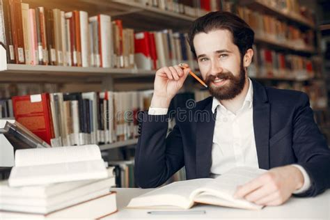 Handsome Guy Study at the Library Stock Photo - Image of literature ...