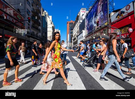 People crossing Avenida Corrientes. Buenos Aires, Argentina Stock Photo ...