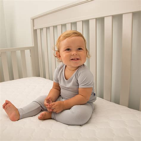 What to Look for in a Crib Mattress Pad | Sealy Baby - Buying Guide