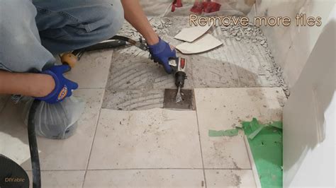 How to remove ceramic tiles and thinset using a DIY homemade tool ...