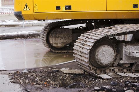 Track of a tractor excavator Stock Photo by wirestock | PhotoDune