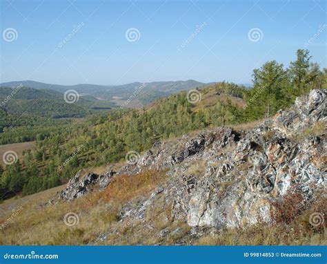 Rocky terrain stock image. Image of forest, clouds, rocks - 99814853