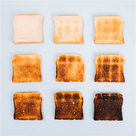 Premium Photo | Top view of bread slices at varying stages of toasting ...