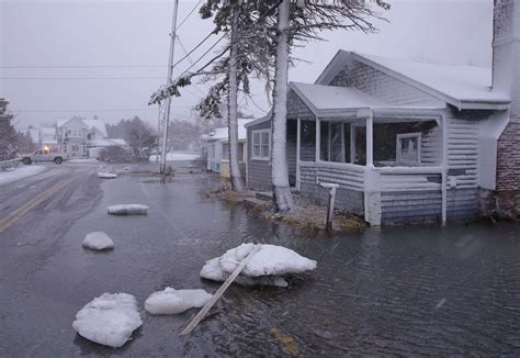 Winter storm causes flooding in New England; East Coast faces deep ...