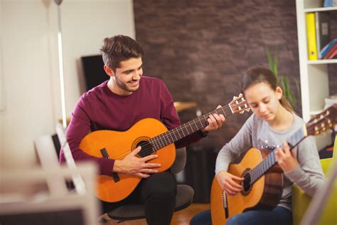 5 reasons why you should take guitar lessons | Progress Academy