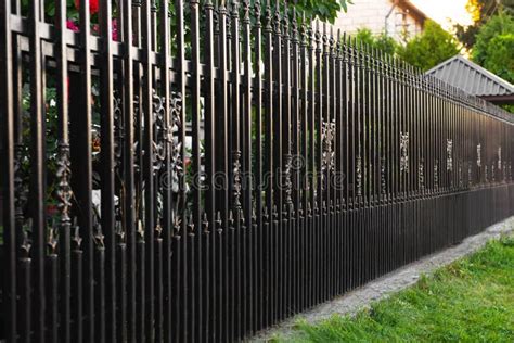 Beautiful Black Iron Fence Near Pathway Outdoors Stock Image - Image of ...