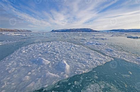 Sea Ice and a Glacial Landscape 6989944 Stock Photo at Vecteezy