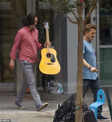 Keanu Reeves takes acoustic guitar on Bill & Ted 3 set | Keanu reeves ...