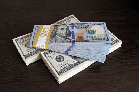 $100 Dollar Bills Stacks - Stacks of Money on the Table Stock Photo ...