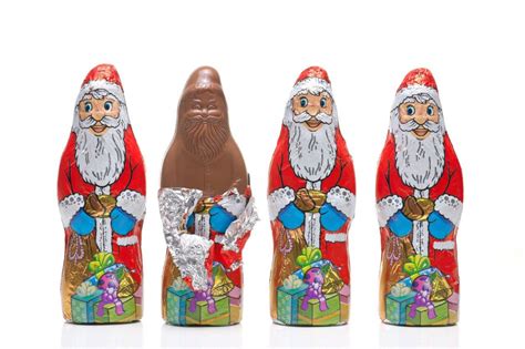 Chocolate Santas wrapped in aluminium foil