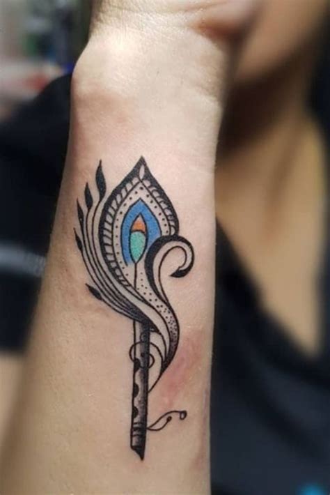 Side Wrist Mor Pankh Tattoo | Mor pankh tattoo, Tattoo designs wrist ...