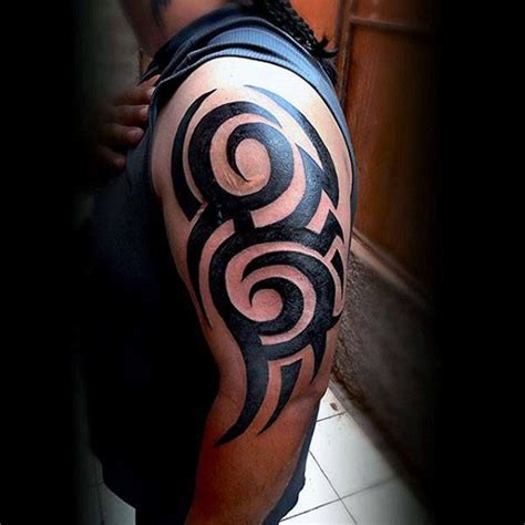 75 tribal arm tattoos for men interwoven line design ideas – Artofit