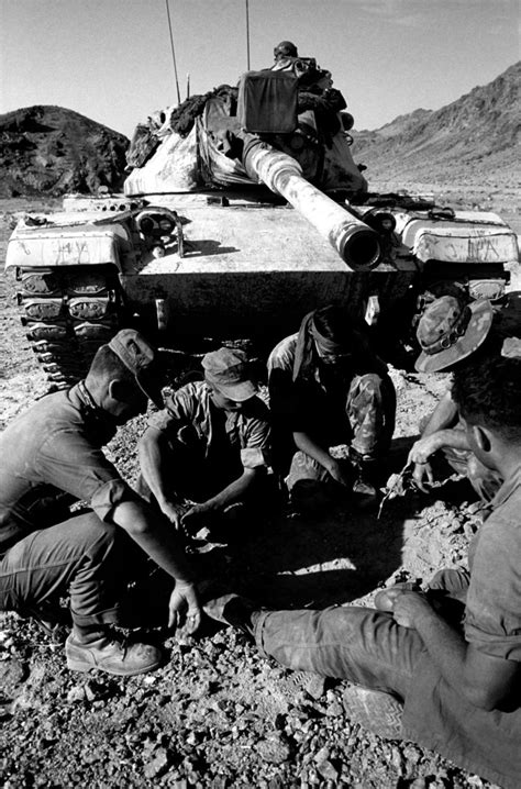 A Marine M60 tank crew discusses their strategy in an upcoming tank ...