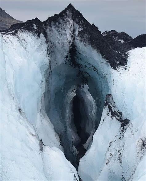 An ice cave formed in the Solheimajokull glacier, Island Image by Karol ...