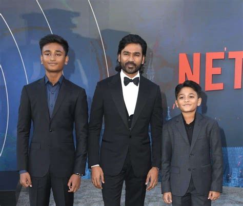 Dhanush attends the screening of The Gray Man with sons Yatra and Linga