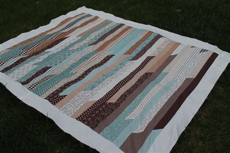 Thimbelina: Jelly Roll Race Quilt