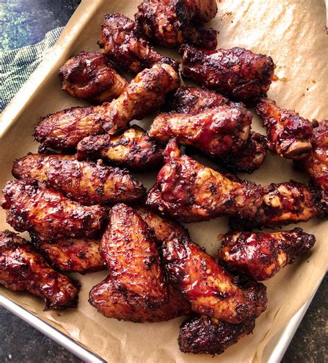 Insanely tasty chicken wing recipe, dry rubbed, then hickory smoked to ...