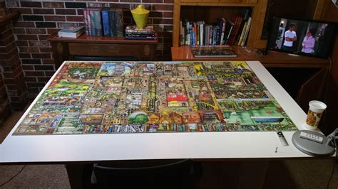 Just finished my first 5,000 piece puzzle 'Bizarre Town' : r/Jigsawpuzzles