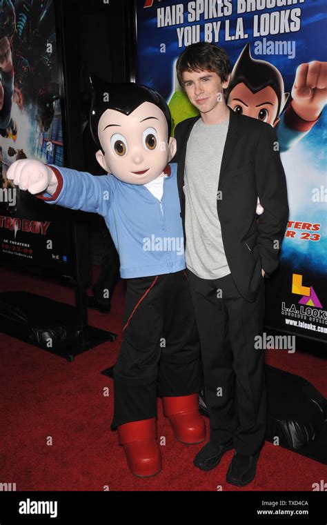 LOS ANGELES, CA. October 19, 2009: Freddie Highmore with Astro Boy ...