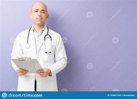 Doctor Ready for a Consultation Stock Photo - Image of serious, reading ...