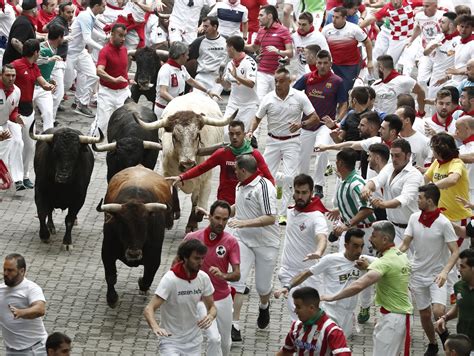 Woman, 19, gored in the back on second day of Pamplona's bloody Running ...