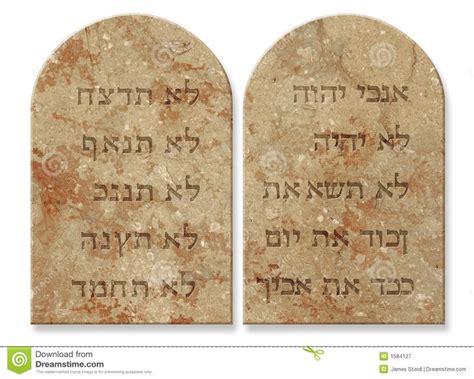 two stone headstones with hebrew writing on them