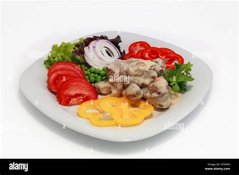 Champignons with sauce Stock Photo - Alamy