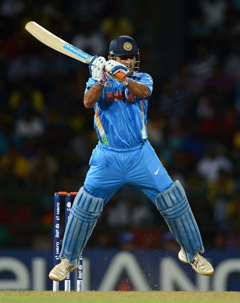 MS Dhoni attempts to pull off his helicopter shot | Cricket Photo ...