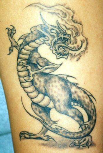 tattoo dragon: Fire breathing dragon tattoo