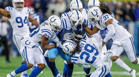 Colts defense puts final touch on surprising year, suffocate Titans