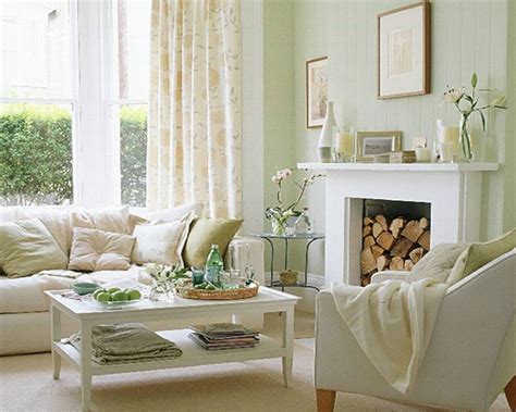 creamy white living room with accents of very light green and blue ...