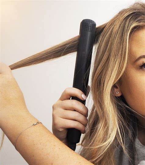 How to Curl Hair with a Straightener, According to a Stylist | Curl ...