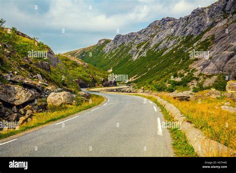 Driving a car on a mountain road Stock Photo - Alamy