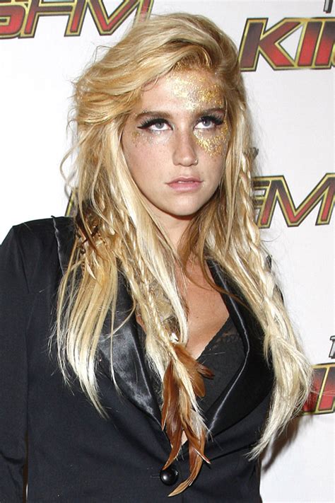 Kesha Wavy Golden Blonde Hair Feathers, Mini Braids Hairstyle | Steal ...