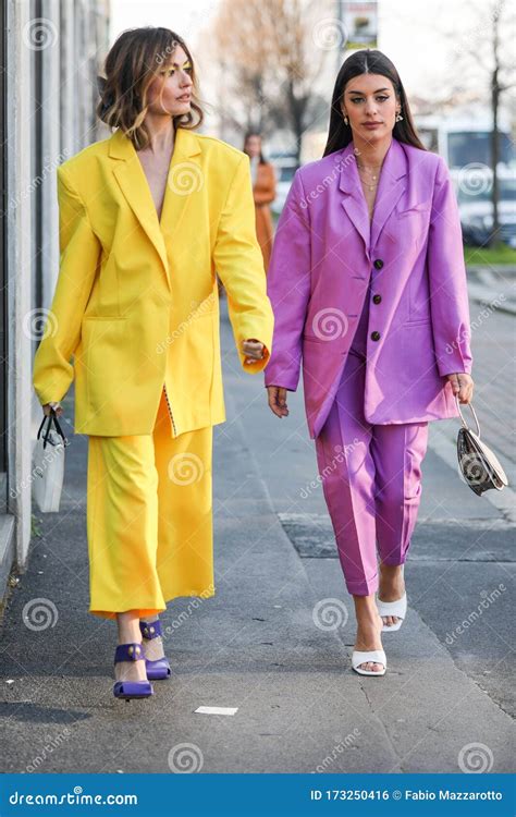 Models Wear a Purple and a Yellow Suit during the Gucci Fashion Show at ...