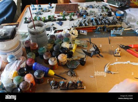 Painting Warhammer lizardmen figures Stock Photo - Alamy