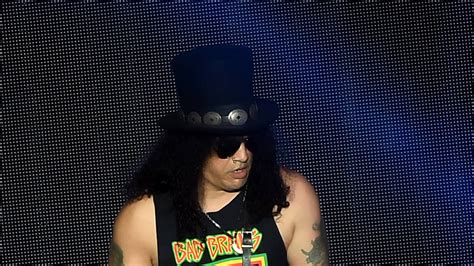 Why Does Slash From Guns N' Roses Wear A Hat? - Radio X