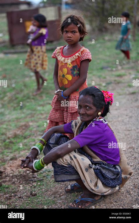 Old woman and girl. Baiga tribe. Karangra Village, Chattisgadh, India ...