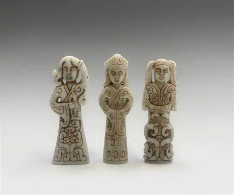 Lot 301 - Three Chinese carved greenstone figures, of