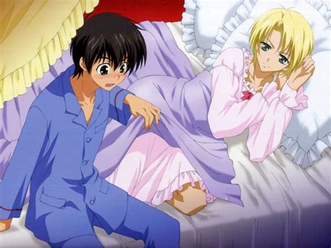 two anime characters are laying on a bed