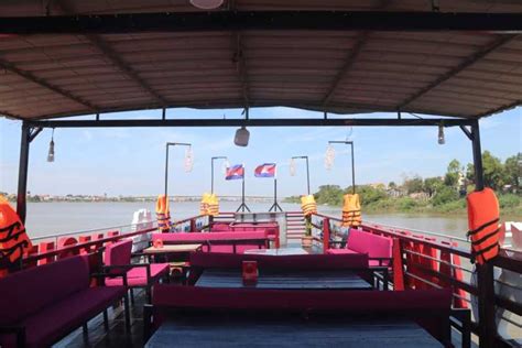 Phnom Penh Mekong/Tonle Sap river sunset wine/fruits cruise | GetYourGuide